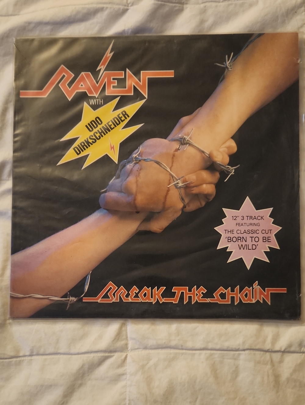 Raven "Break the Chain" Vinyl Record - Black Cover with Red & Yellow Graphics